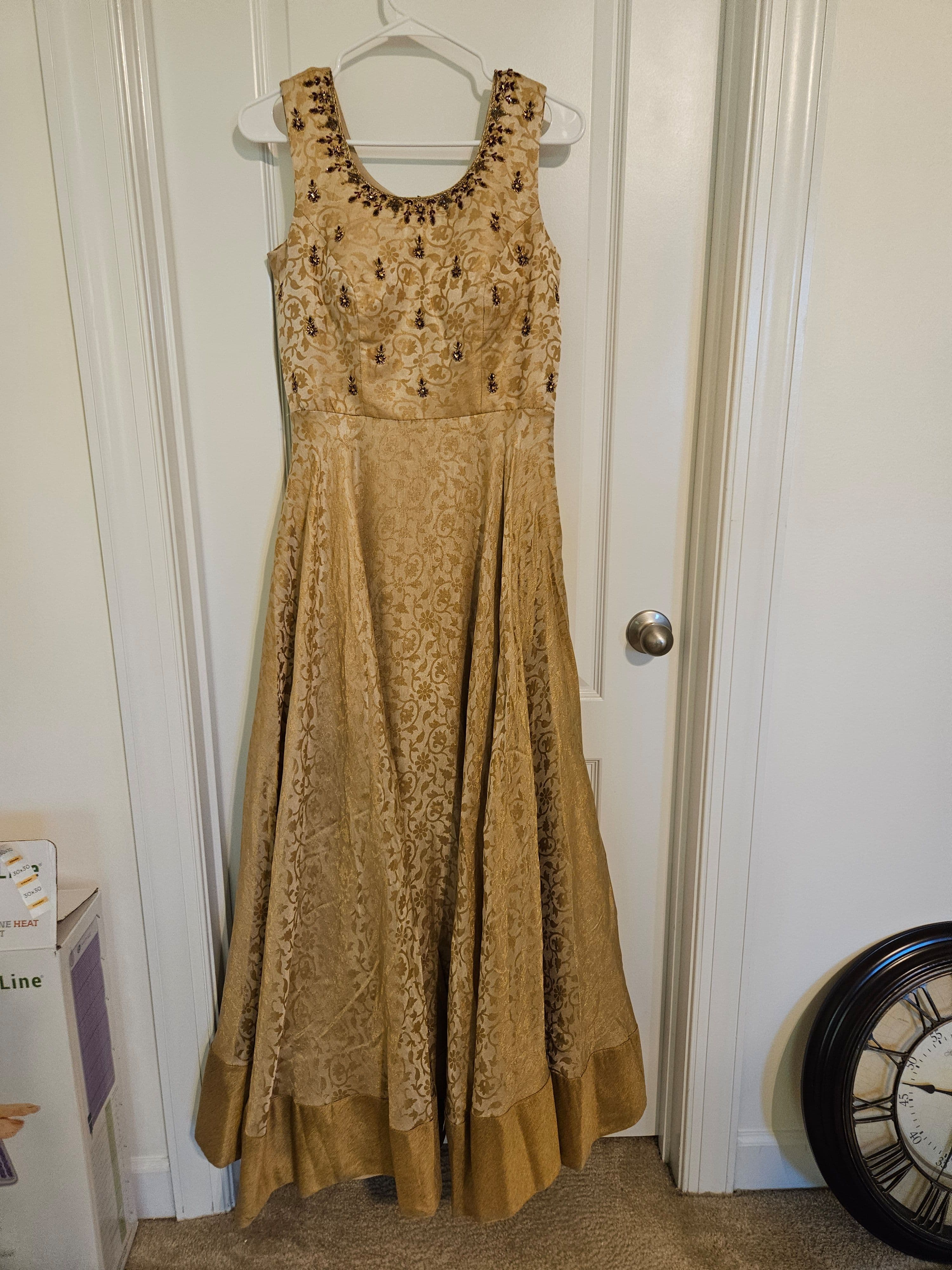 Elegant Gold Brocade Anarkali Style Gown with Embellished Neckline