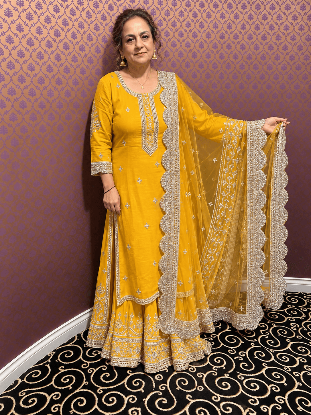 Vibrant Yellow Sharara Suit with Silver Gota Patti Work and Net Dupatta