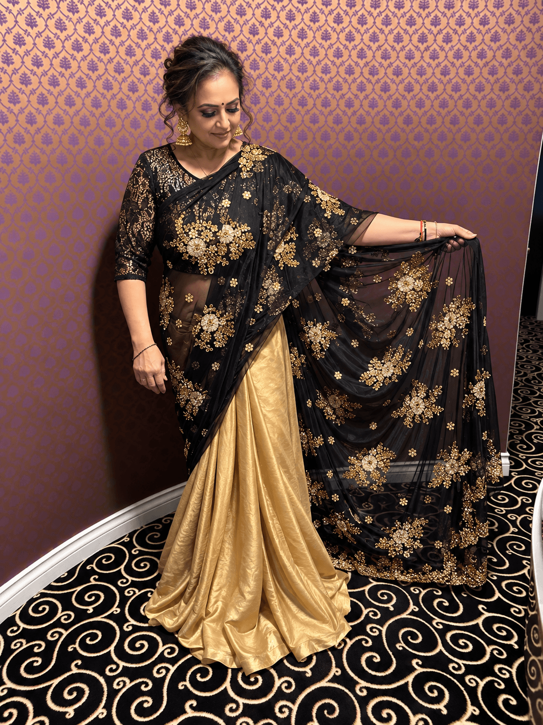Elegant Black and Gold Embroidered Net Saree with Satin Skirt