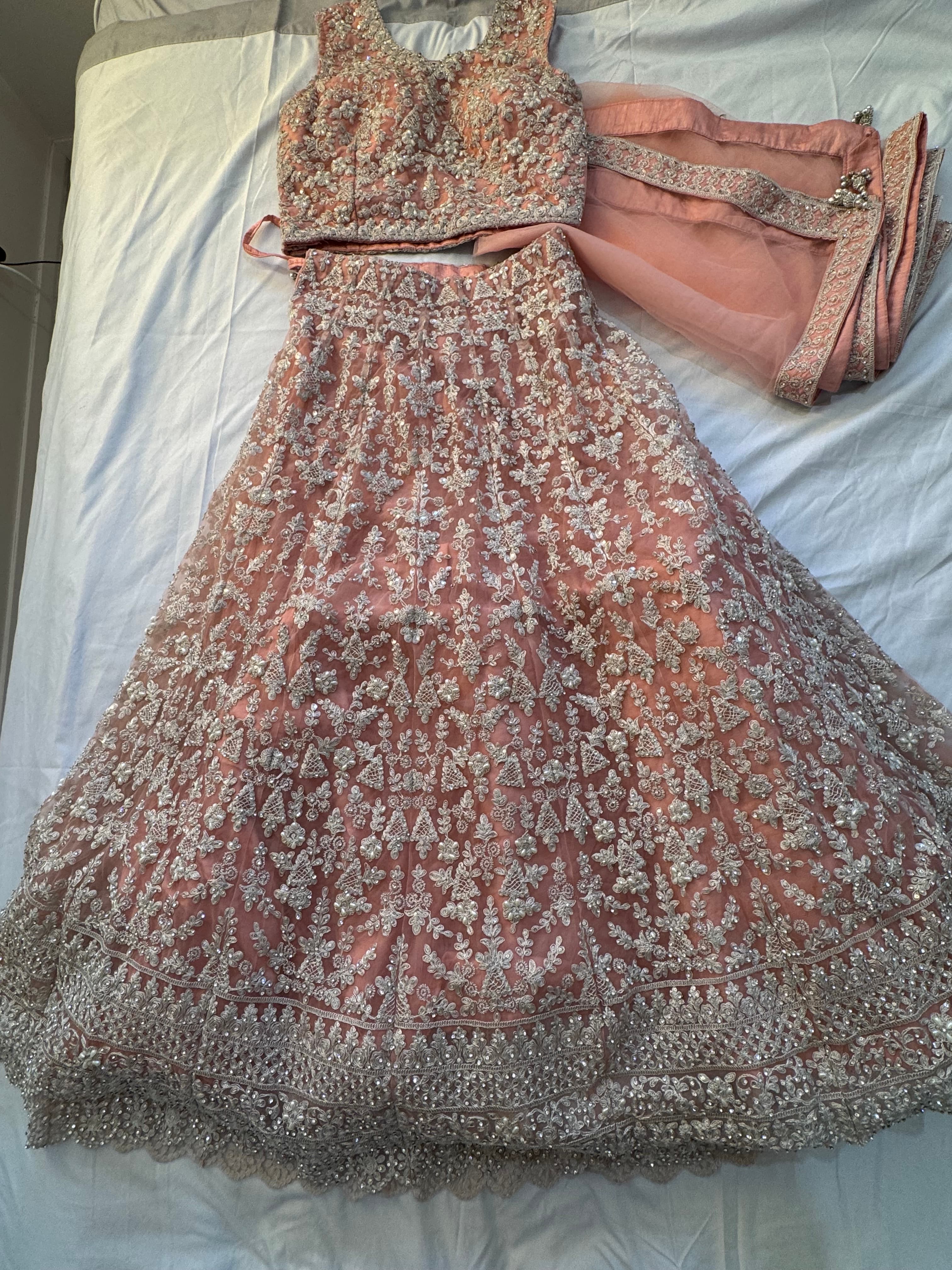 Stunning Peach Net Lehenga with Intricate Silver Sequin and Stone Work - Perfect for Weddings &