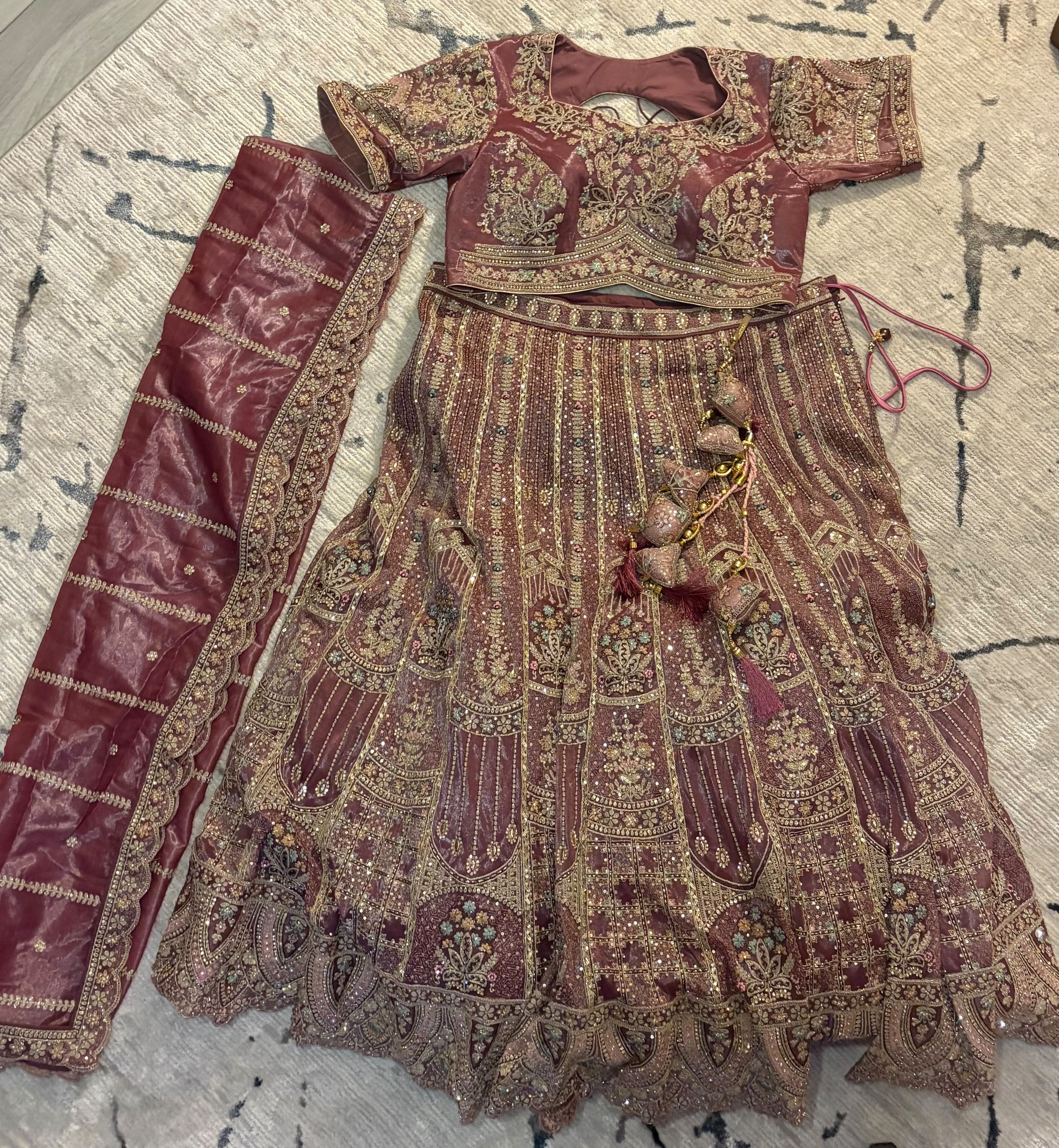 Stunning Maroon Bridal Lehenga with Intricate Gold and Sequin Embroidery