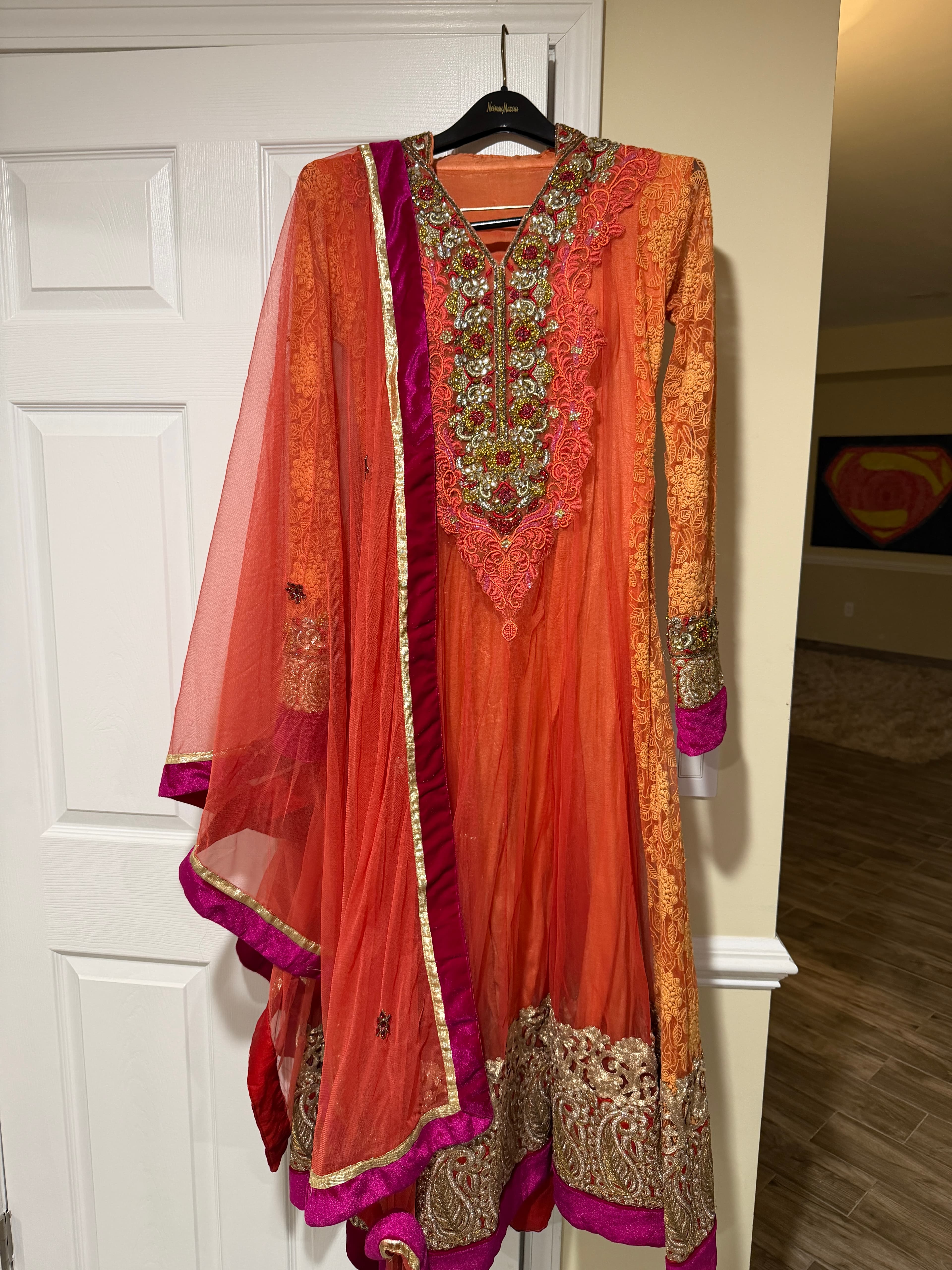 Vibrant Orange & Pink Anarkali Suit with Intricate Embroidery and Net Dupatta