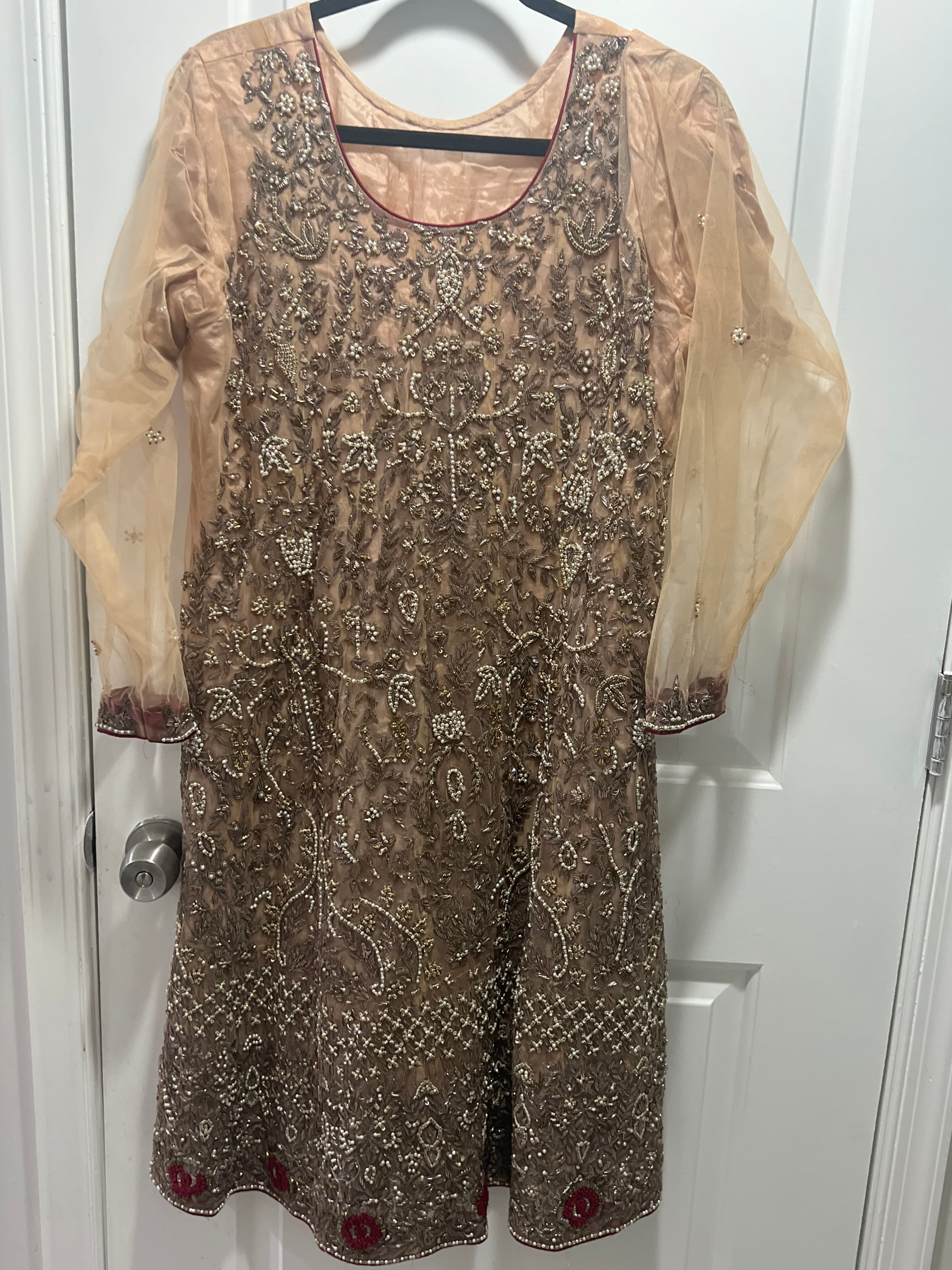 Fully worked of beads and golden thread
