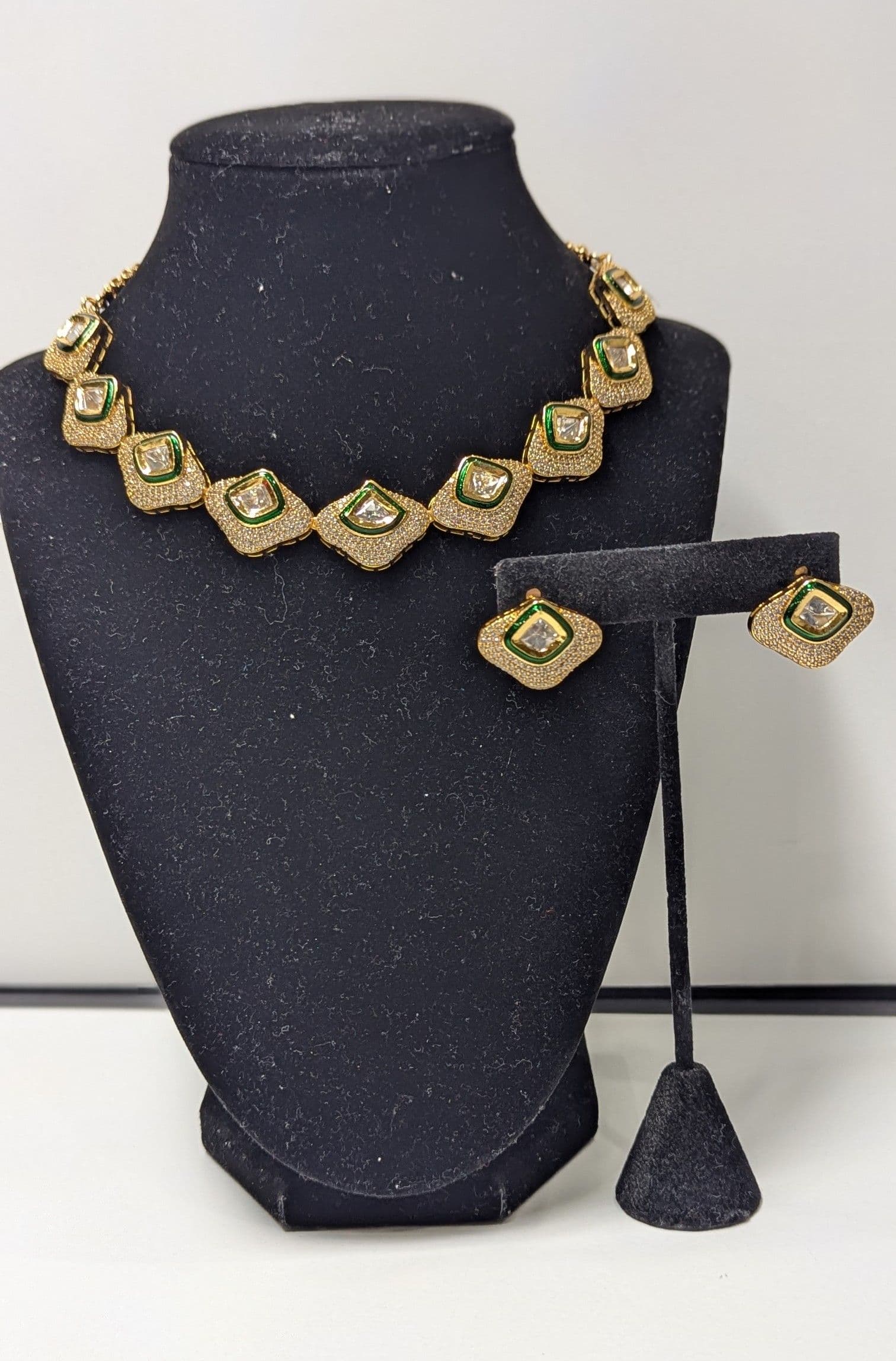 Premium Quality American Diamond Gold-Toned Necklace Set with Green Enamel Detailing
