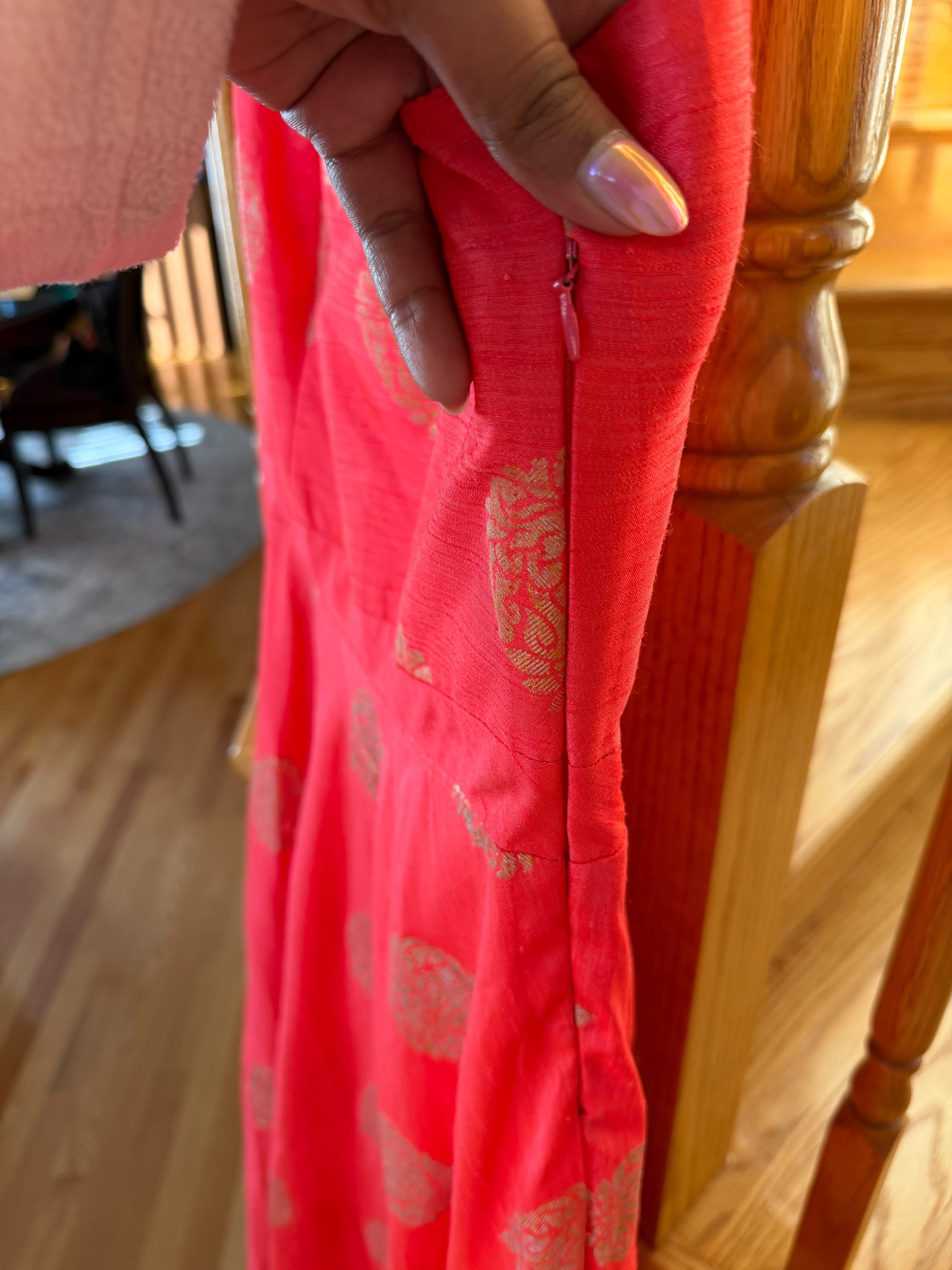 Vibrant Coral Pink Anarkali Suit with Gold Brocade and Embroidered Neckline